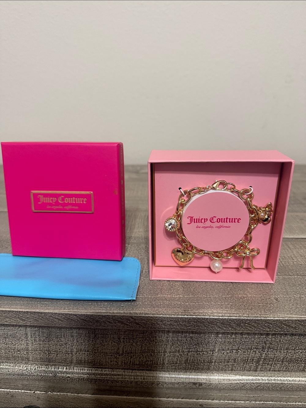 Juicy Couture Gold Charm Bracelet with Pink Presentation Box